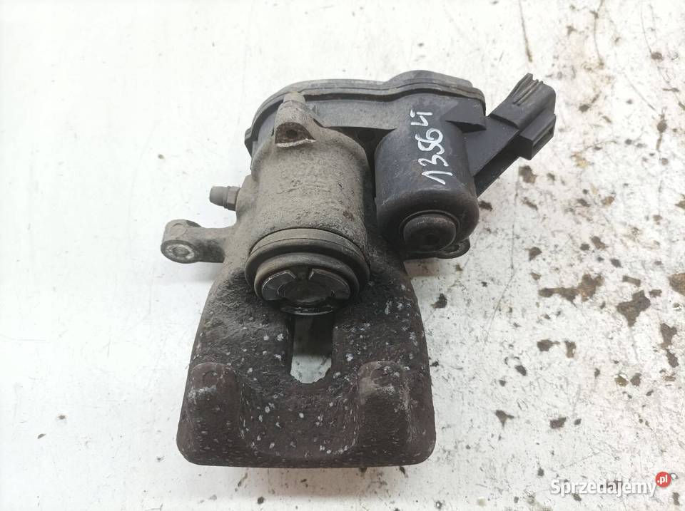 ZACISK HAMULCOWY LEWY TYŁ ELEKTRYCZNY 16 DCI