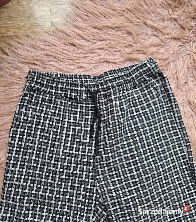 Świetne klasyczne spodnie materiałowe w kratę ze Rozmiar 38(M) małopolskie