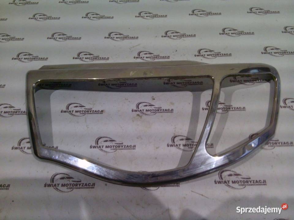 MITSUBISHI L200 07r ramka chromowa lampy lewej Kielce