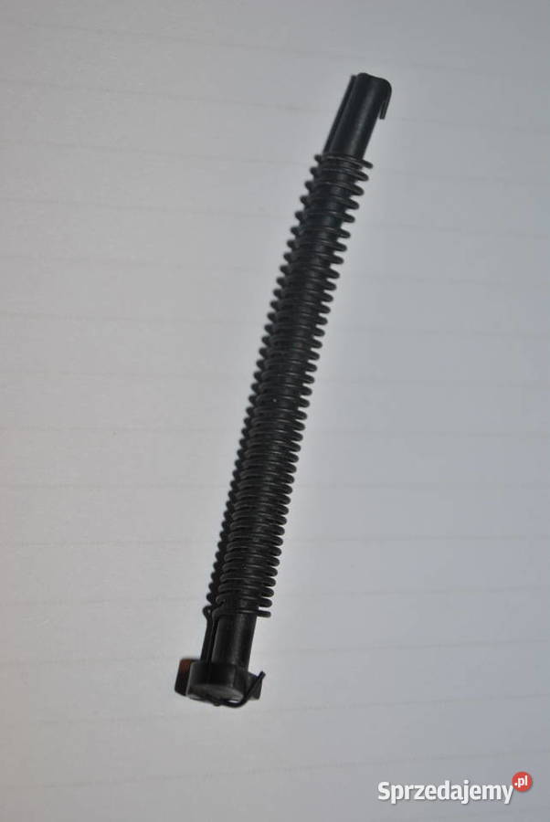 Drążek przesuwny ze sprężyną naciągową pokrywy osobowe Poręba