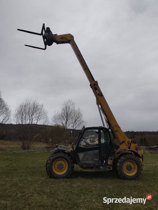 ładowarka teleskopowa cat th 407 Sucha Beskidzka