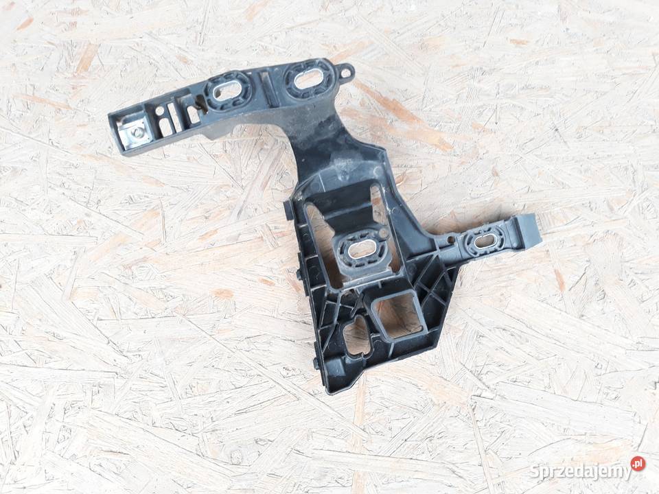 OPEL CORSA E ŚLIZG POD LAMPĘ LEWY PRZÓD 39003558 osobowe Międzychód