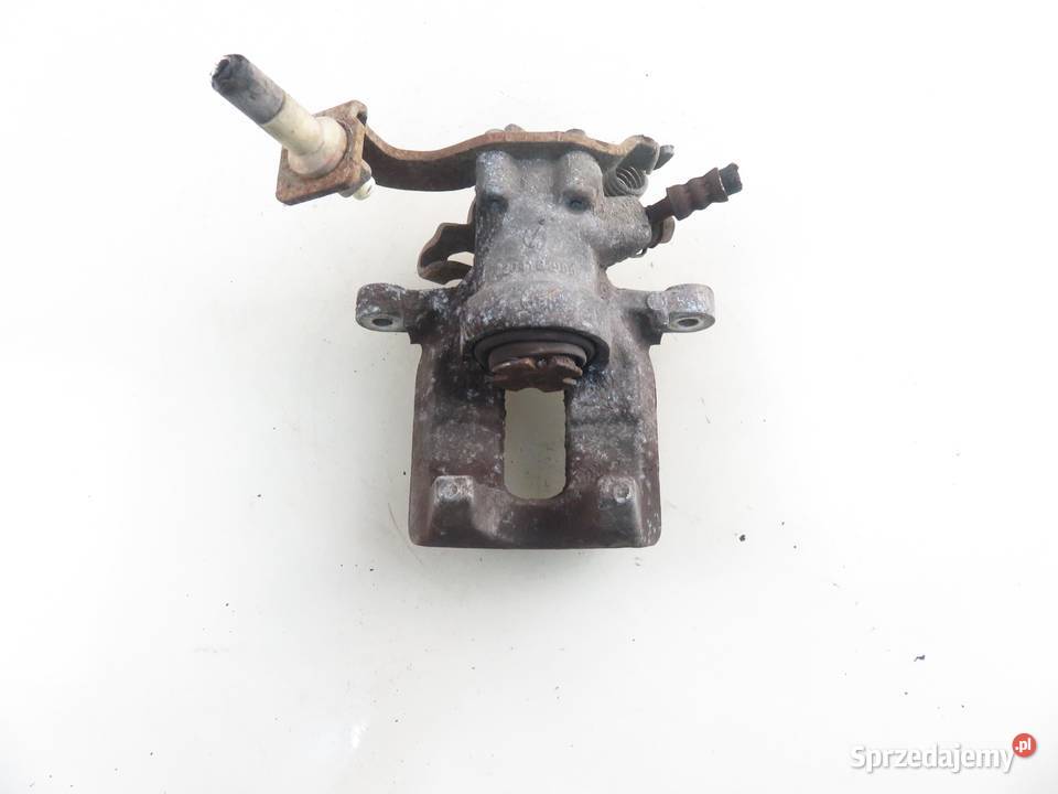 ZACISK LEWY TYŁ TOYOTA AURIS I E15 osobowe