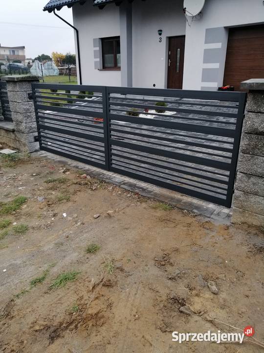 Ogrodzenia nowoczesne palisadowe kute metal Ogrodzenia i bramy wielkopolskie Poznań