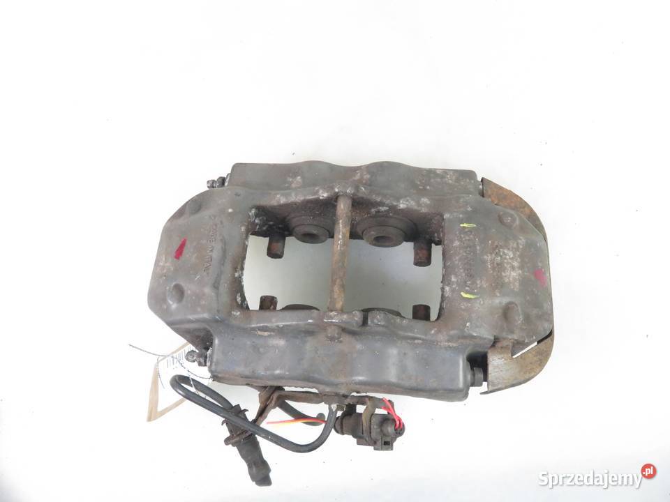 ZACISK LEWY TYŁ AUDI Q7 42 FSI 208930051A