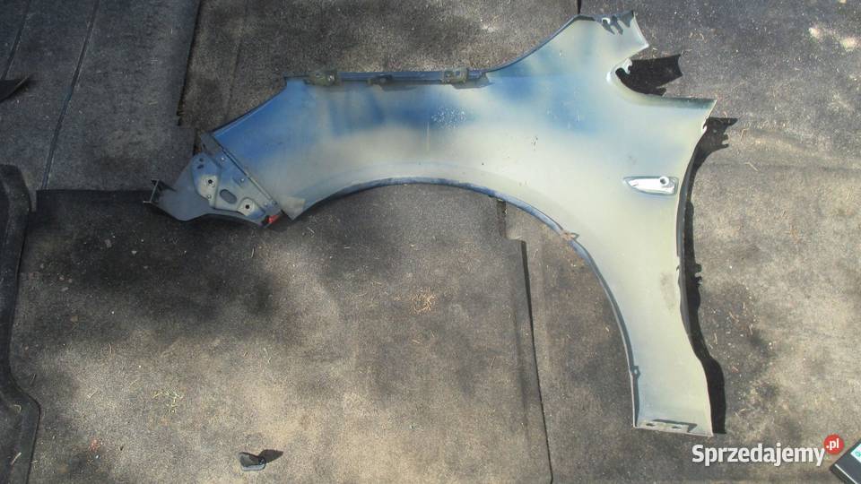 OPEL ASTRA J IV 10r błotnik prawy przód