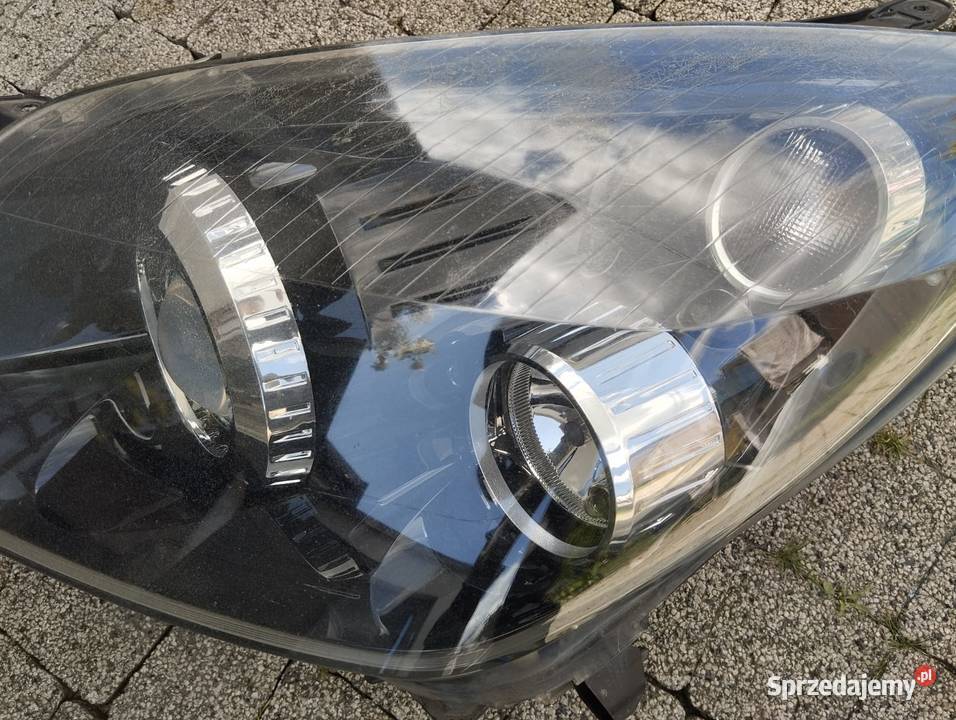 Lampa Opel Astra H III lewy przód BiXenon Lampy przednie Kamieniec