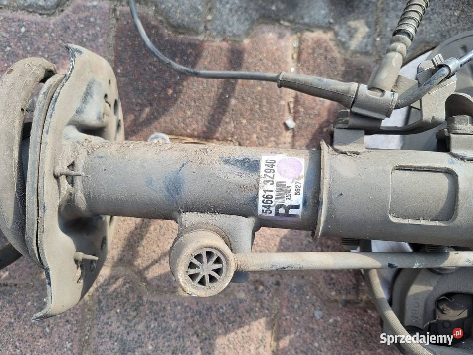 MCPERSON AMORTYZATOR SPRĘŻYNA ZWROTNICA PRAWY