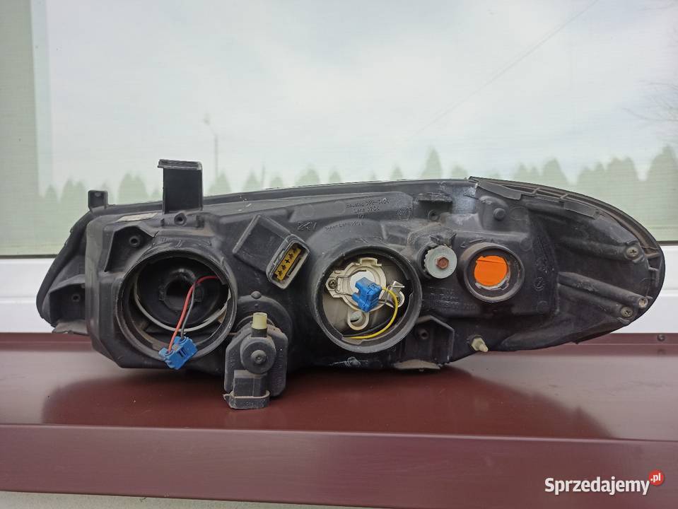 Nissan Almera N16 LIFT FL lampa przednia lewa Lampy przednie