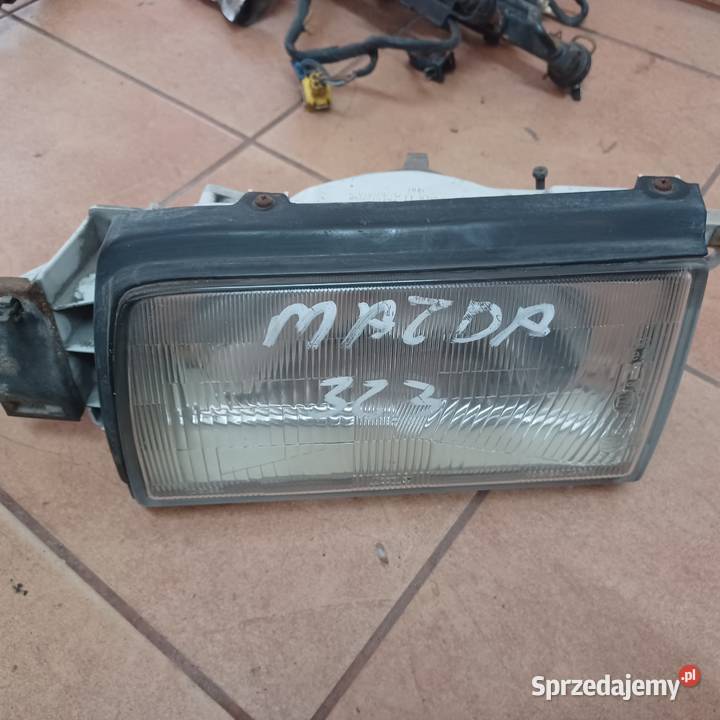 Mazda 323 lampa prawa lewa przod Rakoniewice