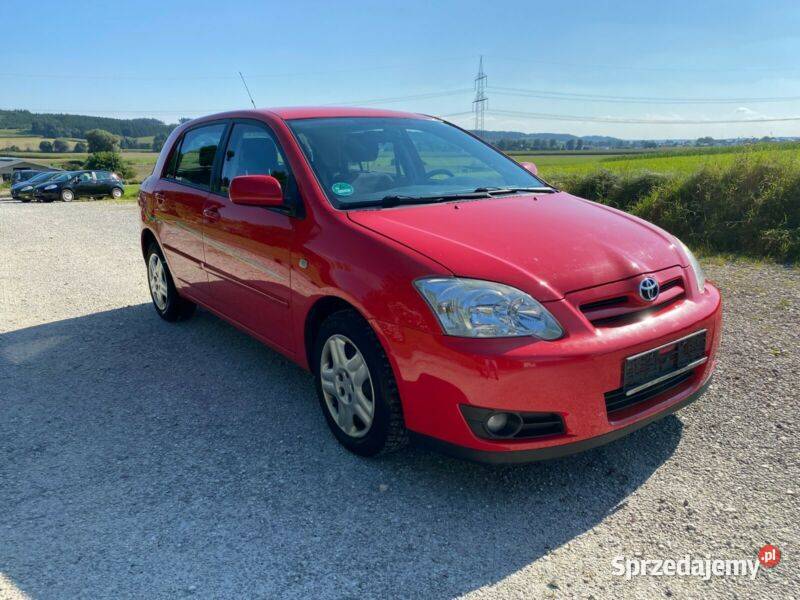 COROLLA E12 drzwi lewy przód czerwoną bez Tarnów