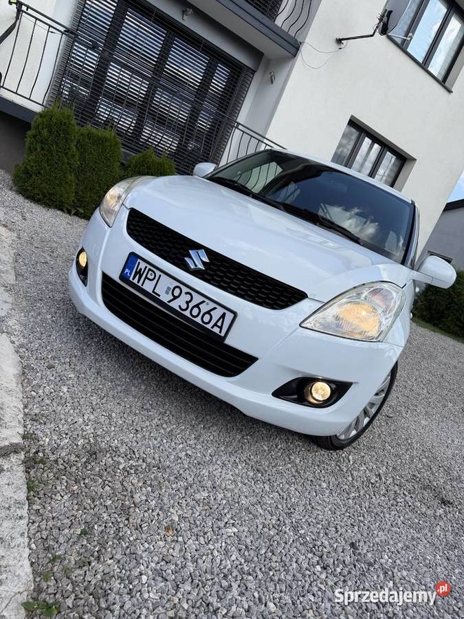 Piękny perłowy Suzuki Swift Disel Płock