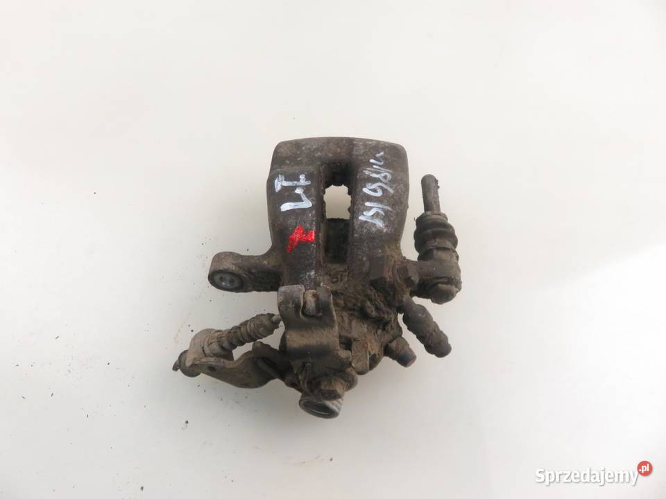 ZACISK LEWY TYŁ OPEL COMBO C 13 CDTI 16V Z 13 osobowe