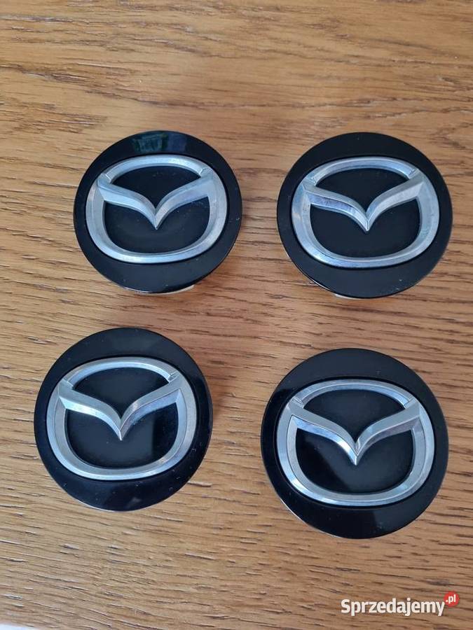 4 oryginalne dekielki Mazda 57 mm BBM237190 osobowe mazowieckie Warszawa sprzedam