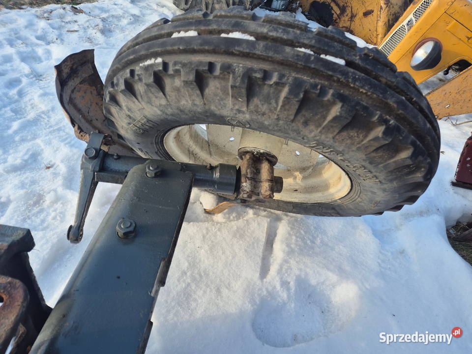 Przednia oś Ursus C330 kołyska koła błotniki Bucze