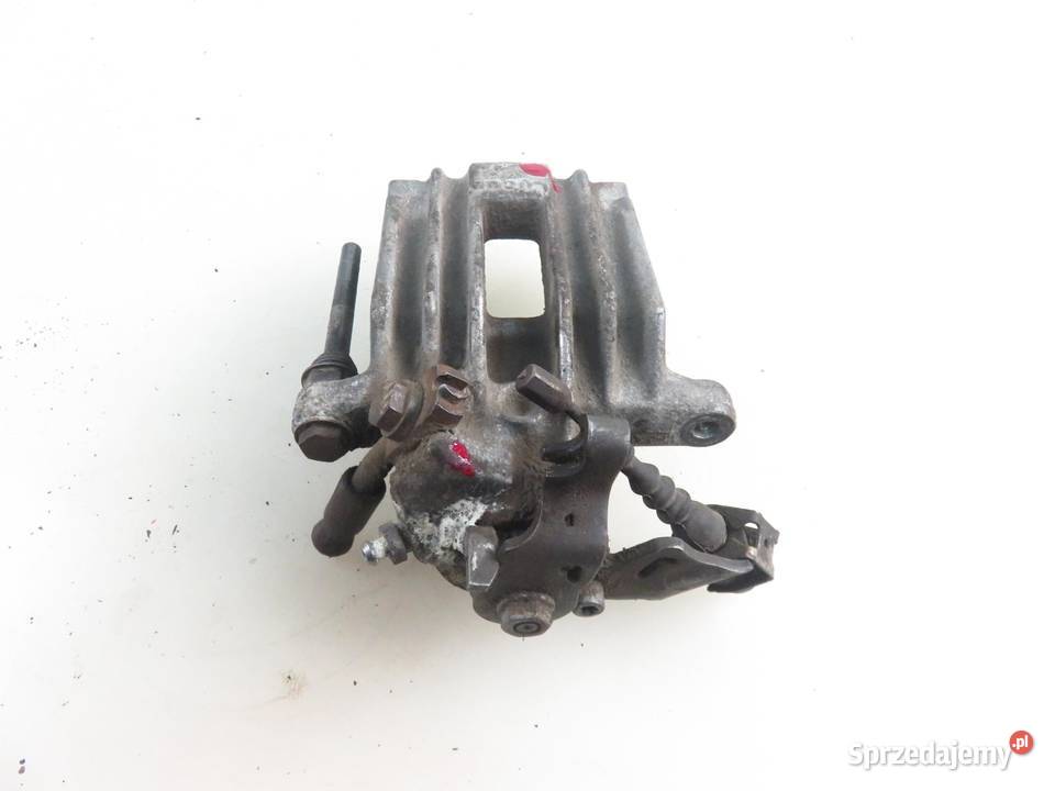 ZACISK PRAWY TYŁ VW POLO IV 9N 14 TDI