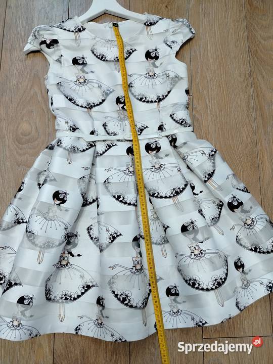 Elegancka wseslna sukienka rozmiar 146 Sukienki i spódniczki Adamów