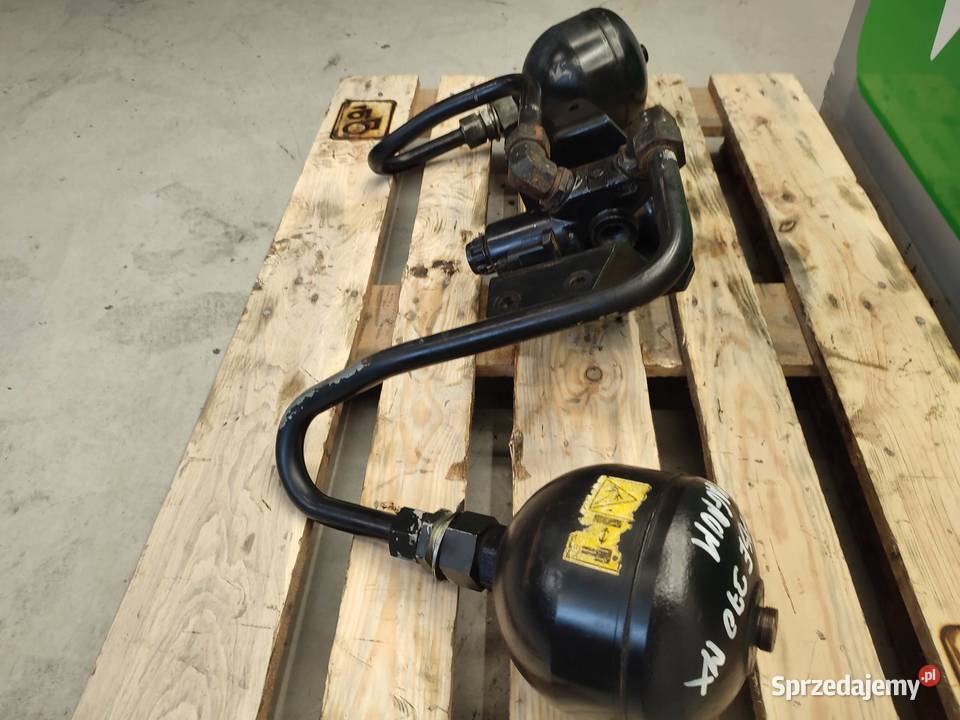 Amortyzacja przedniego tuza Case 370 Magnum