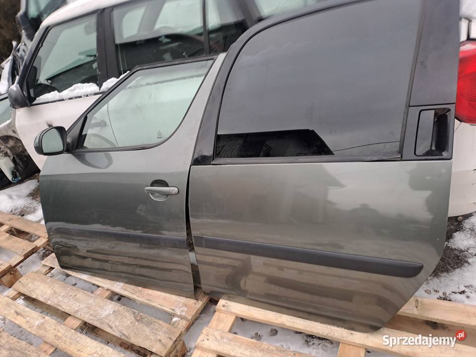 Skoda Roomster błotniki drzwi zderzak lampy pas sprzedam