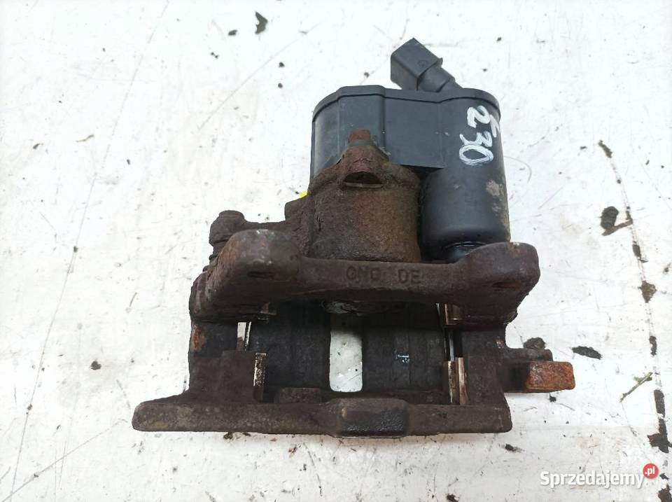 ZACISK HAMULCOWY LEWY TYŁ 32 FSI ELEKTRYCZNY osobowe