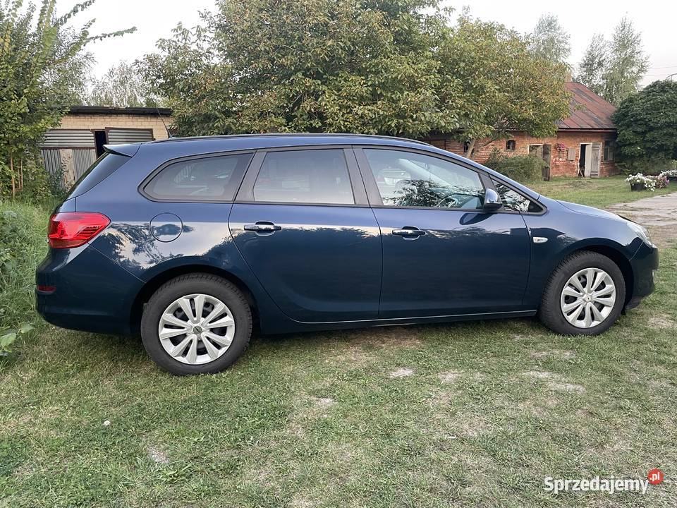 ŚLICZNY OPEL ASTRA 14b 140 132000 relingi dachowe