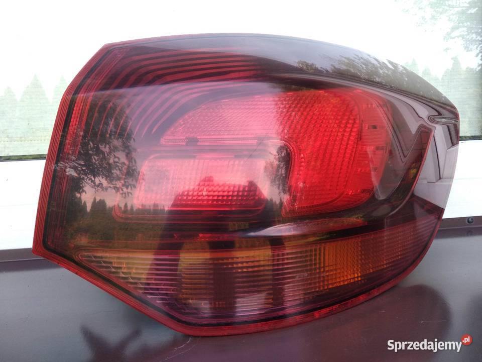 Opel Astra J kombi lampa tył tylna prawa narożna Sieradz
