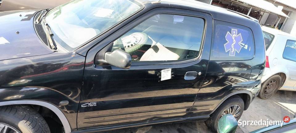 DRZWI LEWE PRZÓD SUZUKI IGNIS 2001 Pozostałe Lipno