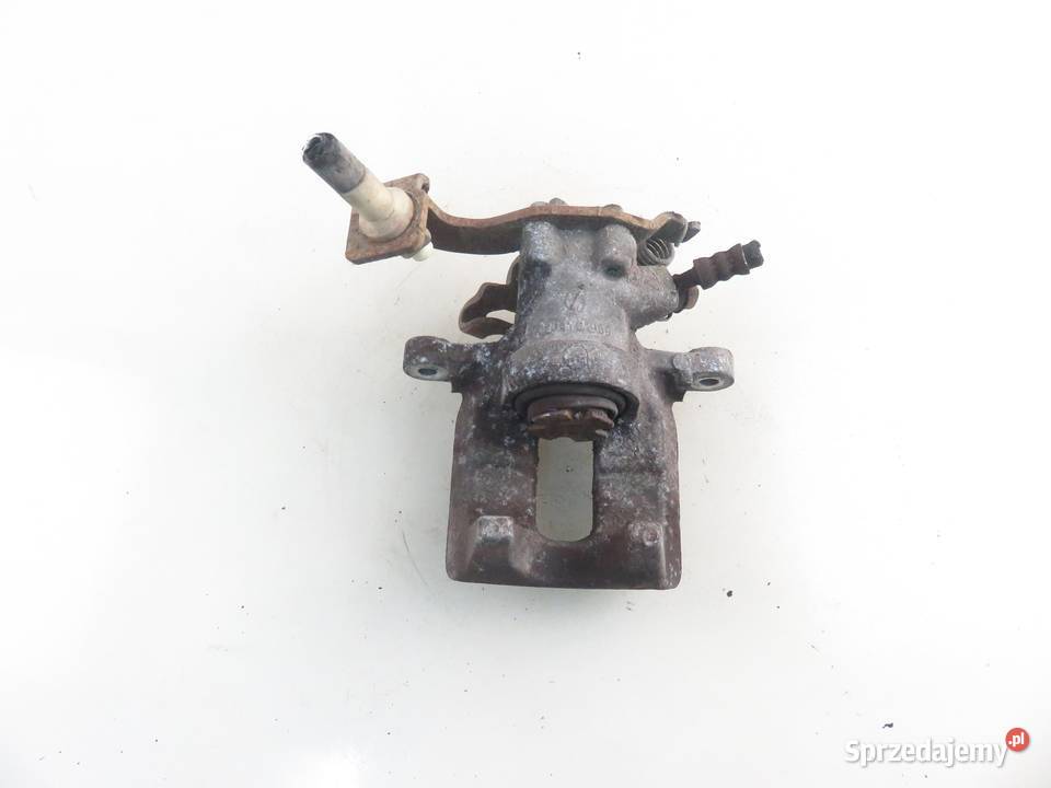 ZACISK LEWY TYŁ TOYOTA AURIS I E15