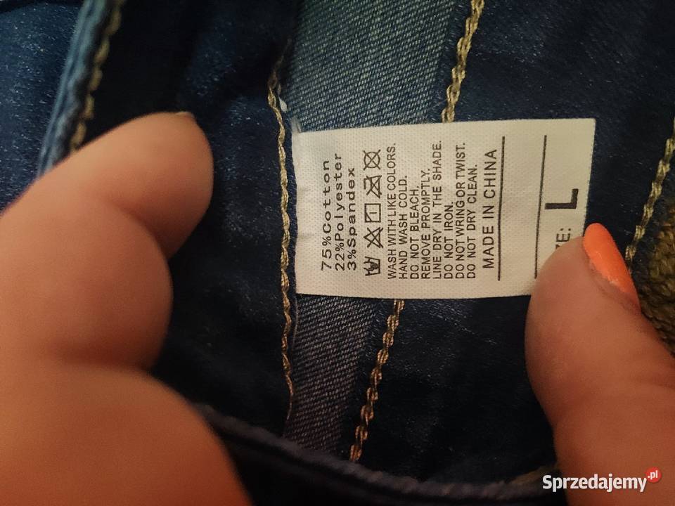 Dżinsy niebieskie z guzikami na nogawkach L Spodnie Piaseczno sprzedam