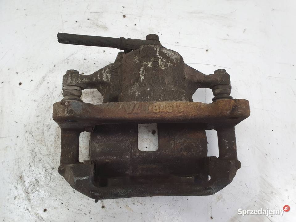 Toyota Corolla XII E21 LEWY PRZEDNI ZACISK osobowe Zaciski i jarzma