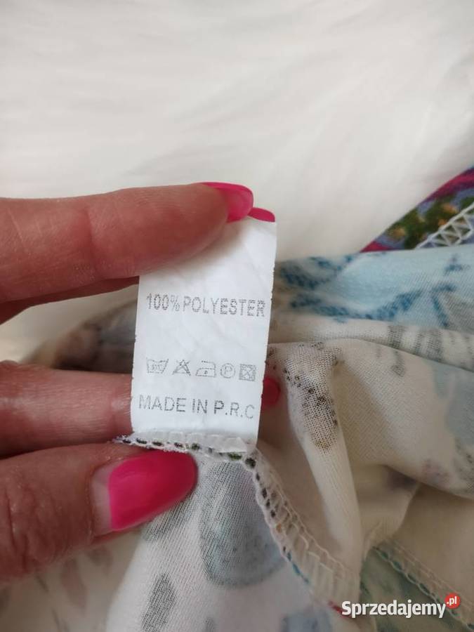 Bluzka z baskinką w kwiaty SM z dekoltem Bluzki i koszule Olkusz