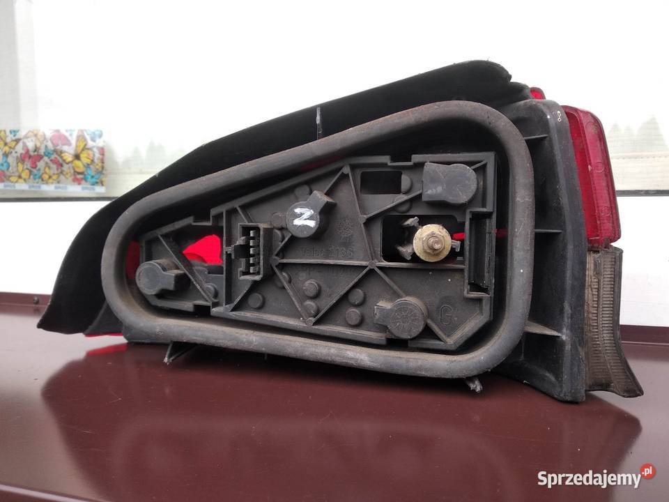 Peugeot 106 lampa tył tylna lewa wkład oprawka Sieradz