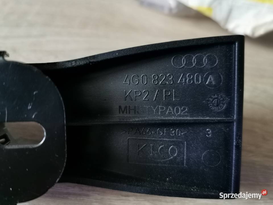 RYGIEL ZAMEK CIĘGNO MASKI AUDI A6 C7 ORYGINAŁ Luzino