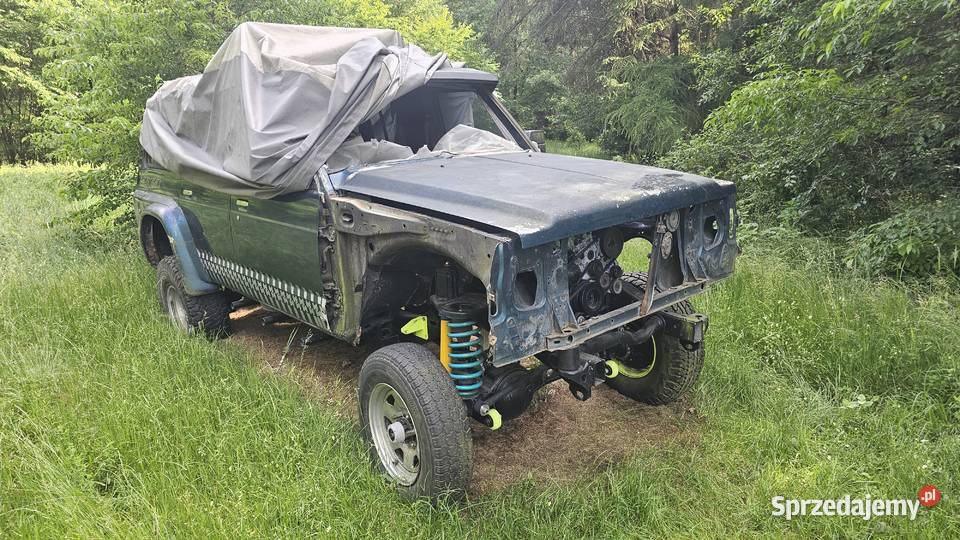 dwie sztuki Nissan Patrol Y60 swap OEM606 BMW uszkodzony Kalety