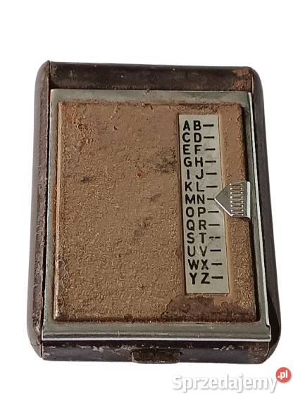 Stara metalowa książeczka telefoniczna