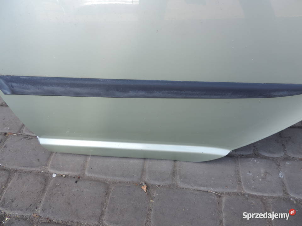DRZWI LEWY TYŁ TOYOTA YARIS 1 HB 6Q2 Motoryzacja