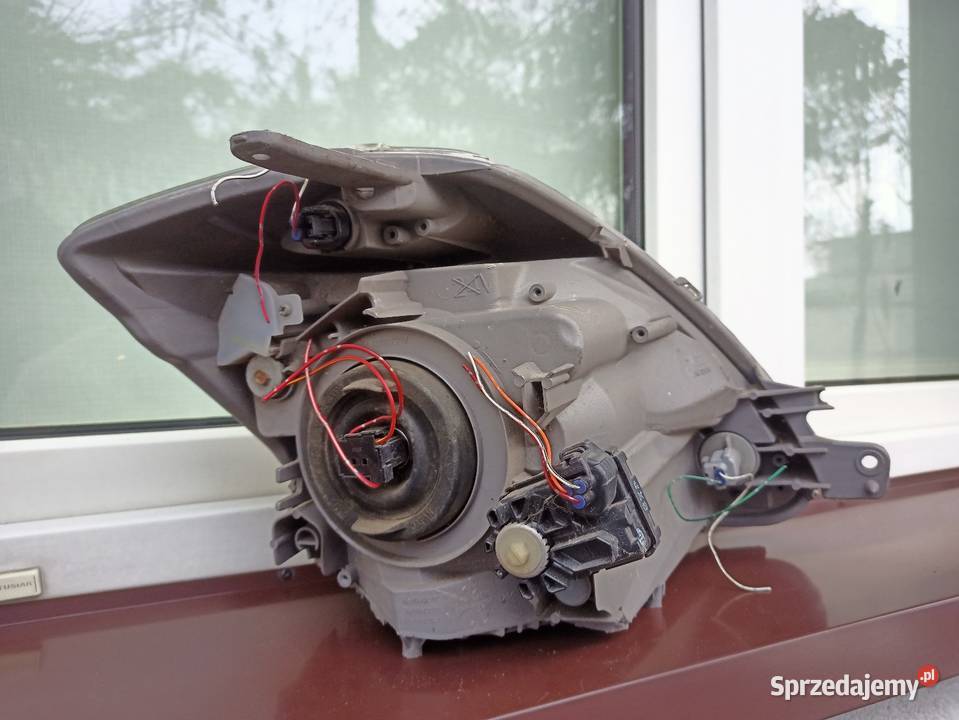 Daihatsu Sirion II 2 lampa przednia lewa osobowe Sieradz