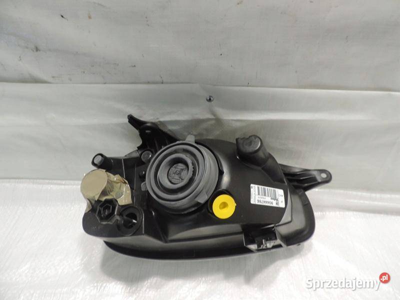LAMPA LEWA OPEL CORSA B ORGINAŁ NOWA 90444786