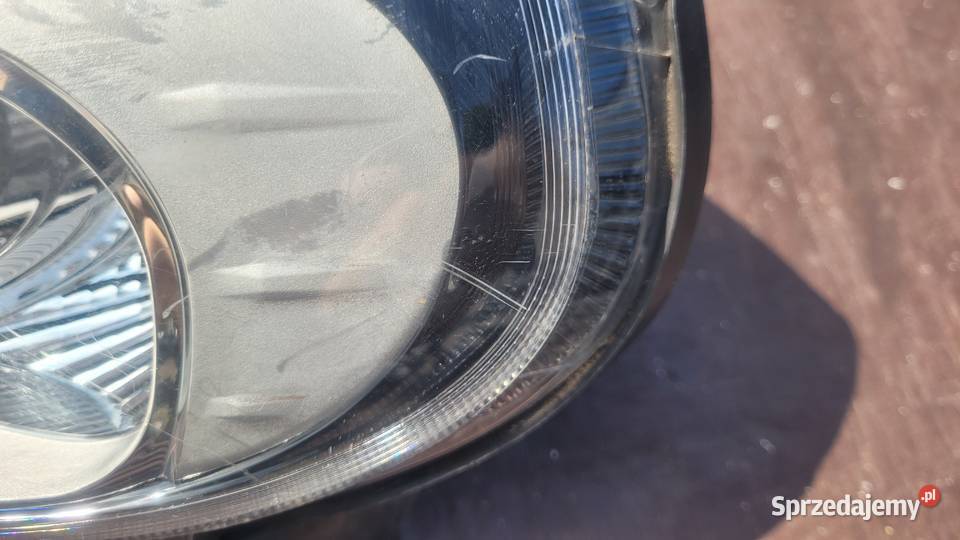 FIAT GRANDE PUNTO EVO 09 LAMPA LEWA PRZÓD Ruda Śląska