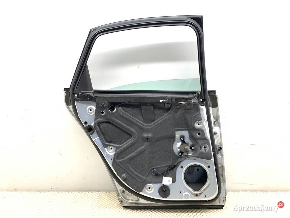 DRZWI LEWY TYŁ AUDI A4 B6 Hatchback 0005 SREBRNY Motoryzacja