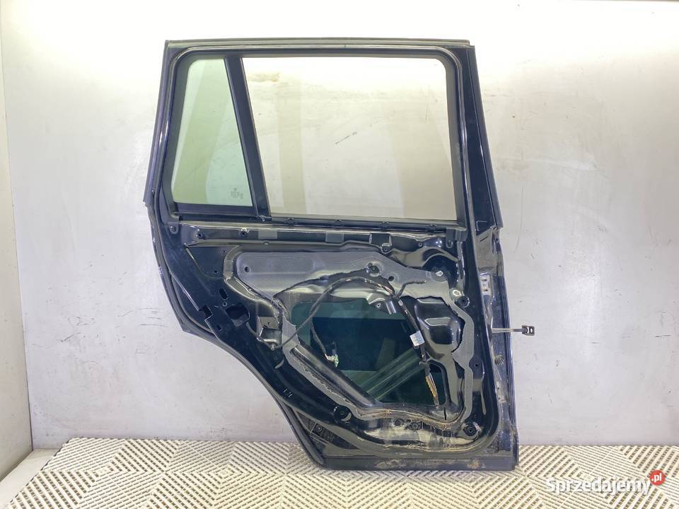 DRZWI LEWY TYŁ BMW E83 SUV 0311