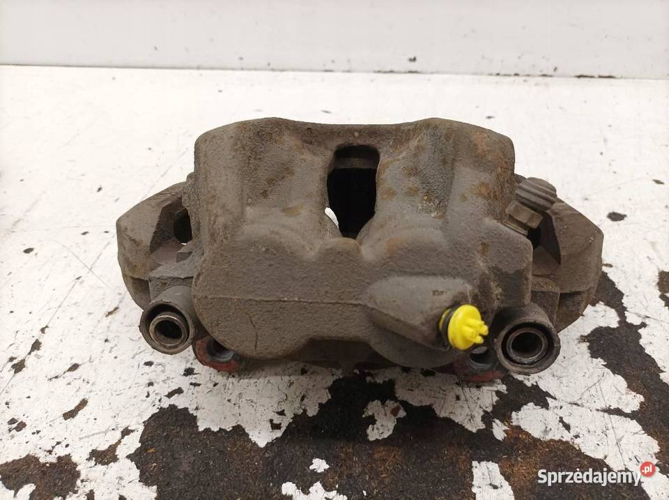 ZACISK HAMULCOWY PRAWY PRZÓD 32 B Volvo XC 90 I