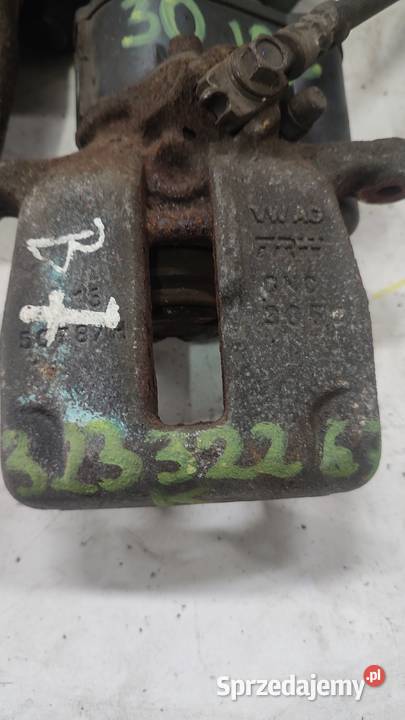 2933ZACISK ELEKTRYCZNY PASSAT B7 LEWY PRAWY TYŁ Części samochodowe świętokrzyskie