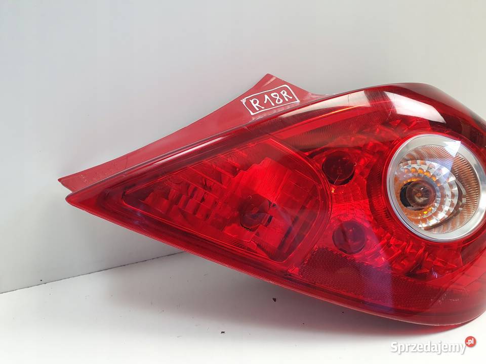 LAMPA PRAWA Opel Corsa D 3 drzwi TYLNA prawy tył Rudka