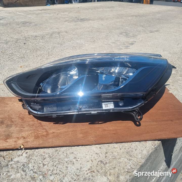 Lampa przednia lewa oryginalna OE Renault Clio Motoryzacja Rawa Mazowiecka
