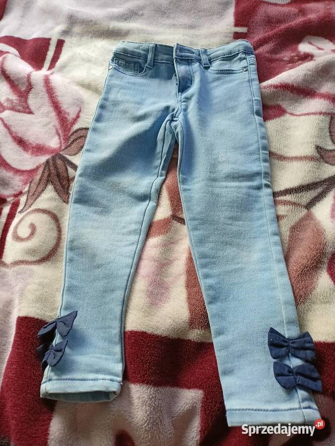 Spodnie jeansowe 110 z kokardką nowe bez metki Włocławek