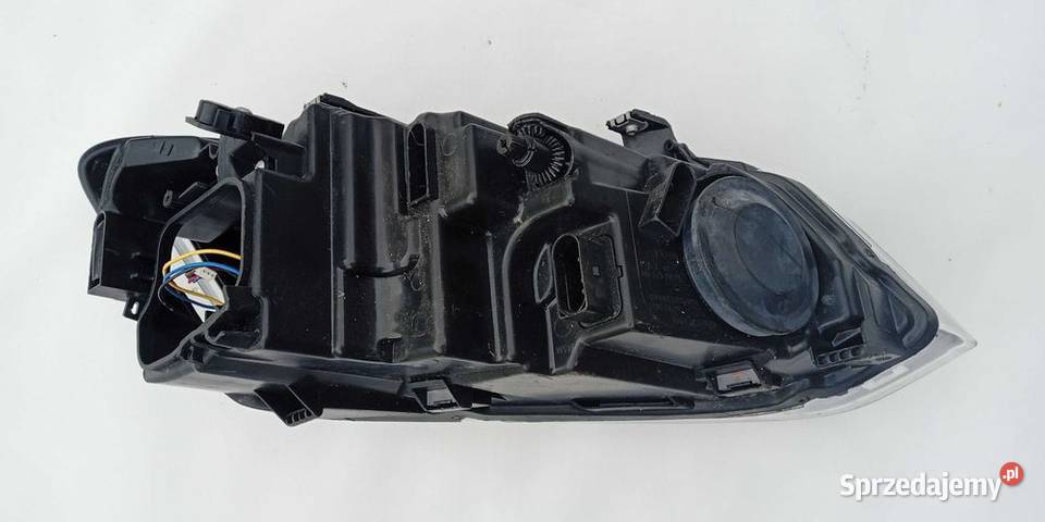 VW Polo 2R reflektor lampa lewy przód lewe Oświetlenie Przeźmierowo