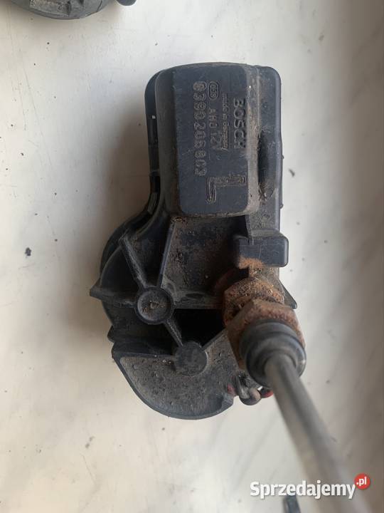 BMW e23 ramiona reflektorów BMW e23 silniczki lewe Mszana