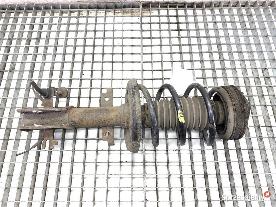 AMORTYZATOR LEWY PRZÓD ZE SPRĘŻYNĄ RENAULT