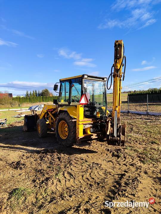 Koparko Ładowarka Massey Ferguson 60HX T Koparka Koła Iwanowice Dworskie